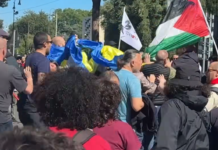 Скандал в Риме: во время манифестации неизвестные напали на людей с украинскими флагами (видео)