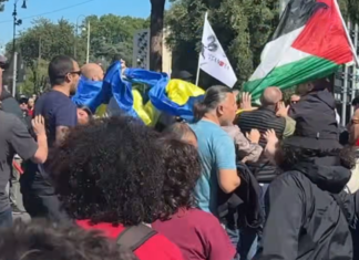 Скандал в Риме: во время манифестации неизвестные напали на людей с украинскими флагами (видео)
