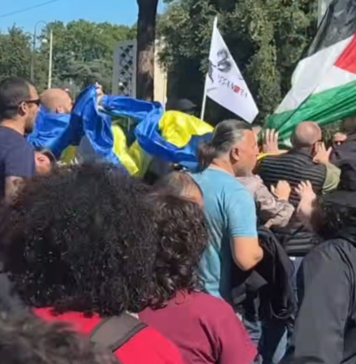 Скандал в Риме: во время манифестации неизвестные напали на людей с украинскими флагами (видео)