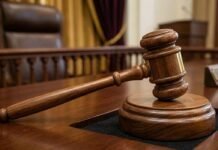 В Запорожье к 8 годам заключения суд заочно приговорили жительницу Васильевки, работающую в оккупационной администрации